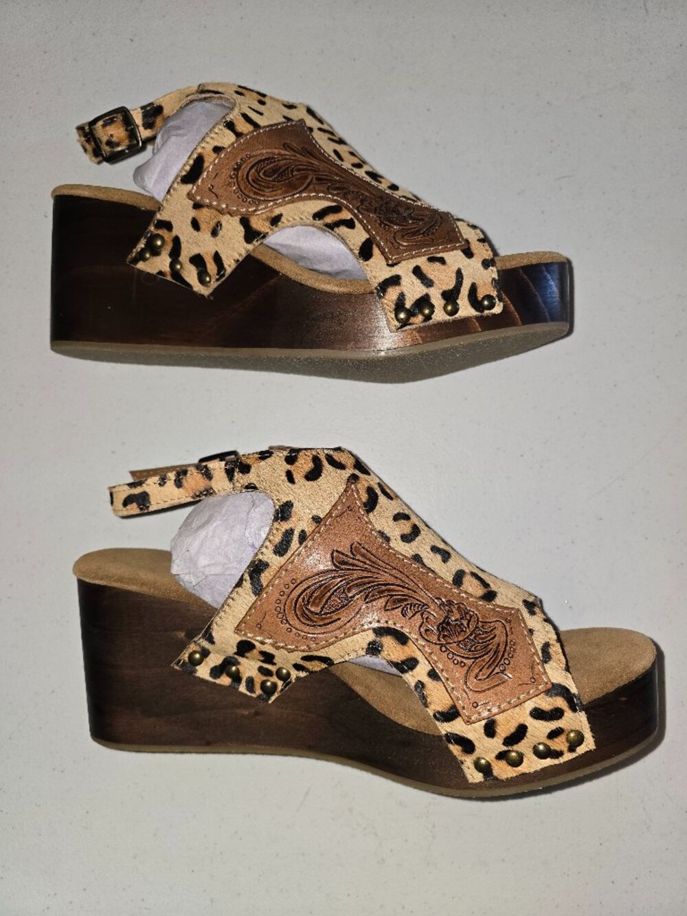 Genuine calf-hair leopard print with tooled leather trim